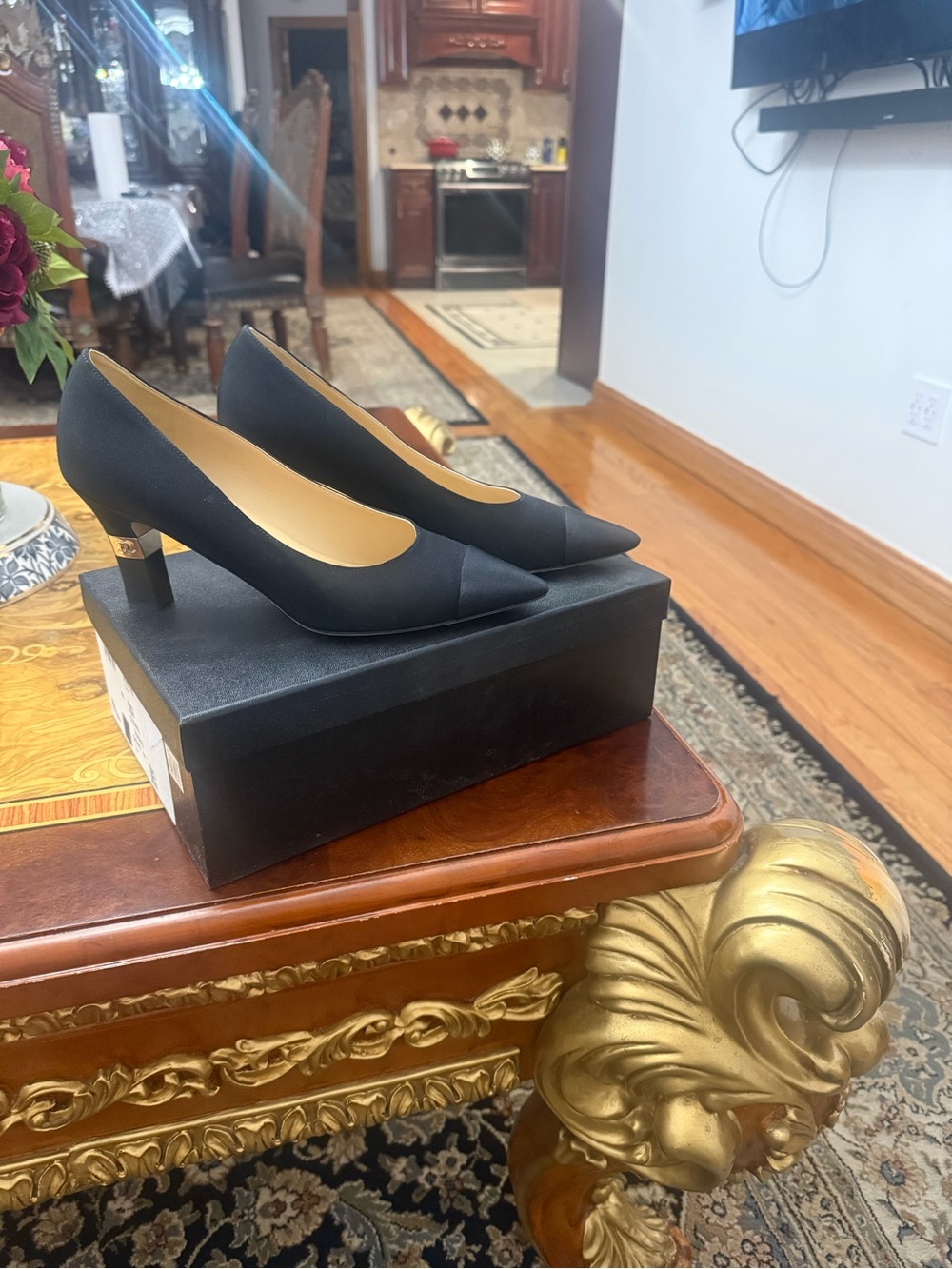 CHANEL Black Satin Pointed Toe Pumps with Gold Accent Heel